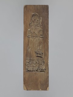 Double-sided gingerbread mold. Obverse: female figure; Reverse: baby in swaddling clothes.