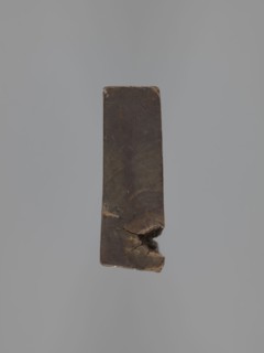 Double-sided gingerbread mould. Obverse: Madonna and Child—Madonna crowned, in a long patterned