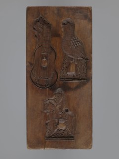 Double-sided rectangular gingerbread mold with three representations on each side. One side: