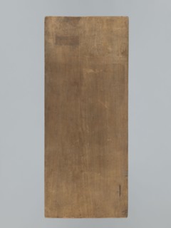One-sided gingerbread form with the image of a rectangular floral and plant ornament. One-sided