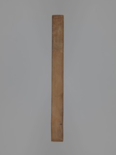Double-sided gingerbread form. Obverse: four representations—two richly decorated oriental pipes