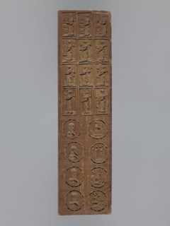 Double-sided gingerbread mould. Obverse: seven floral and plant motifs bouquets of roses and other