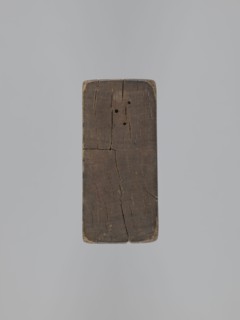 Double-sided gingerbread mold; obverse: baby in swaddling; reverse: baby in swaddling. Rectangular