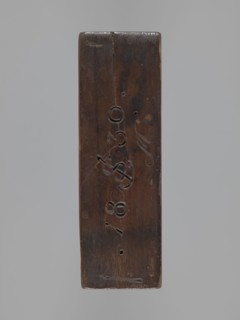 Double-sided gingerbread form. Side A: female figure; Side B: baby in swaddling clothes. Maker