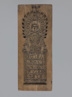Double-sided gingerbread form. Obverse: figure of an angel with the alphabet. Reverse: various