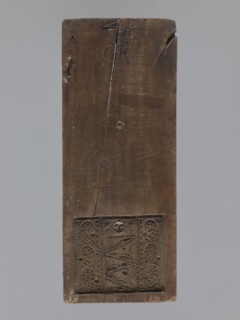 Double-sided gingerbread form. Obverse: figure of an angel with the alphabet. Reverse: various