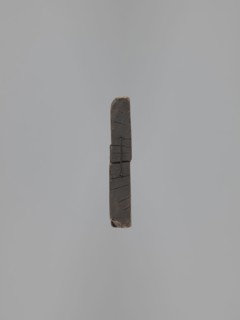 Double-sided gingerbread form. Obverse: figure of an angel with the alphabet. Reverse: various