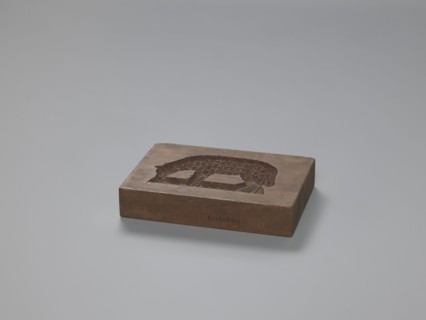 Double-sided gingerbread form, rectangular; one side: sheep grazing in a meadow; other side: goat