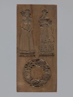 Double-sided gingerbread mould. Obverse: two female figures and a wreath; Reverse: two male figures