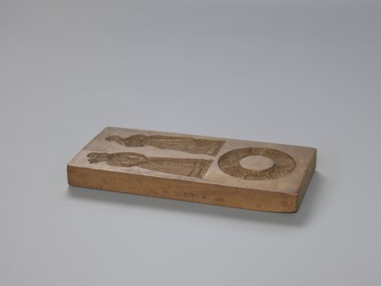 Double-sided gingerbread mould. Obverse: two female figures and a wreath; Reverse: two male figures