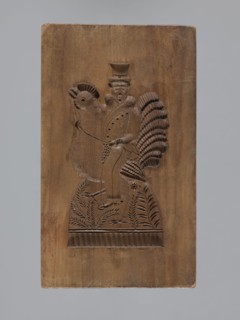 Double-sided gingerbread mold. Obverse: male figure on a rooster; reverse: bird. Double-sided