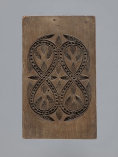 Double-sided gingerbread mould with a plant and floral ornament on both sides;, Gingerbread,