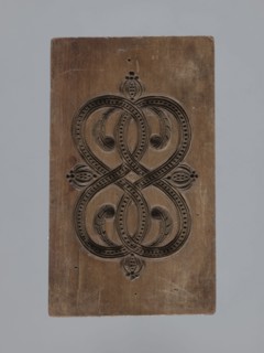 Double-sided gingerbread mould with a plant and floral ornament on both sides;, Materials and