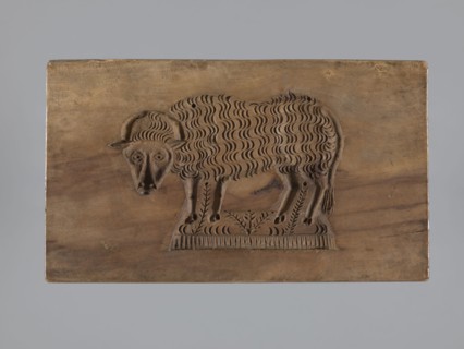 Double-sided gingerbread mold. Obverse: sheep; reverse: hare. Woodcarving, folk-style decorations;