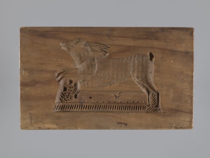 Double-sided gingerbread mold; obverse: sheep, reverse: hare. Woodcarving, folk-style decorations;