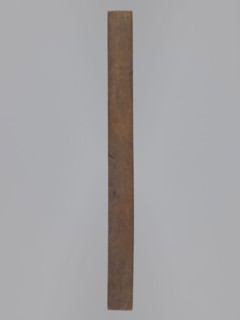 Double-sided gingerbread form. Obverse: male figure with a chalice in hand; reverse: baby in