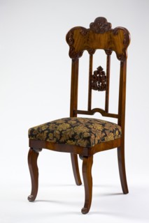 Chair, mahogany chair with a padded seat and a high openwork backrest, with carved decoration.