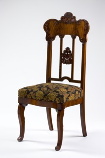 Chair, mahogany chair with a padded seat and a high openwork backrest, with carved decoration.