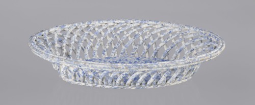 Openwork basket, Cmielów faience and porcelain factory founded 1804. Openwork basket with an oval,