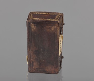 Case for a stamp, bookbinding, embossing; leather case in the form of a chest slightly widened at