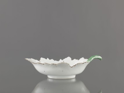 Leaf-shaped bowl, leaf-shaped bowl on a ring-shaped foot. Rims cut in the shape of leaves,