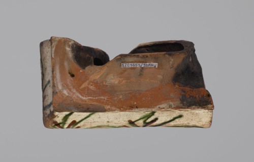 Cornice tile fragments, four; tile cullet; painted with a wavy twirl pattern; 19th century; Hutsul