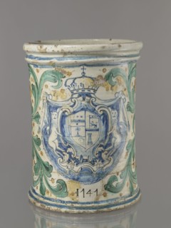 Vessel - flowerpot; cache-pot vessel; cylindrical flowerpot with profiled rollers at base and spout