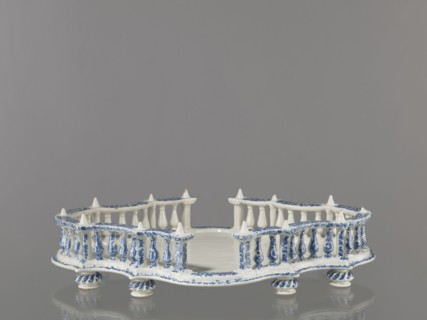 Base for a tabletop tray. Oval architectural tray serving as a base for a tabletop tray. Carved