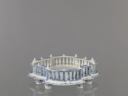 Base for a tabletop tray. Oval architectural tray serving as a base for a tabletop tray. Carved