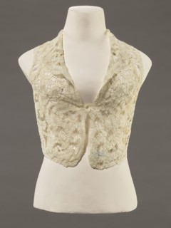 Bodice, lace, provenance, bodice; women's clothing; fashion. Pattern of rosettes connected by large
