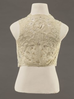 Bodice, lace, bodices, women's clothing, fashion. In a pattern of rosettes connected by large