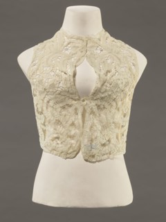 Bodice, lace, bodices, women's clothing, fashion. In a pattern of rosettes connected by large