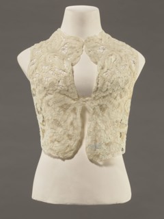 Bodice, lace;, Pattern of rosettes connected by large spiders and heads; pattern of stylized floral