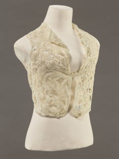 Bodice, lace, provenance, bodices; women's clothing, fashion. In a pattern of rosettes connected by