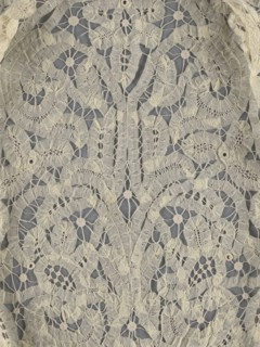 Bodice, lace, bodices, women's clothing, fashion. In a pattern of rosettes connected by large