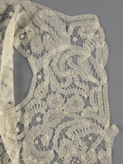 Bodice, lace, bodices, women's clothing, fashion. In a pattern of rosettes connected by large
