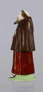 Three-part inkwell in the form of a monk figurine. Consisting of three movable parts: a movable