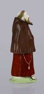 Three-part inkwell in the form of a monk figurine. Consisting of three movable parts: a movable