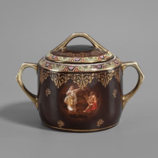 Sugar bowl with lid from a tea service set. Cylindrical sugar bowl with slatted handles,