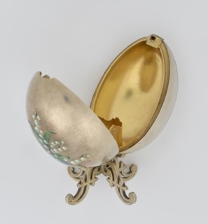 Easter egg, lilies of the valley and flowers motif; silver egg, smooth, composed of two opening