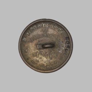 Round uniform button, slightly convex, shank broken off. Obverse inscribed D:S:/P:E. Reverse in rim