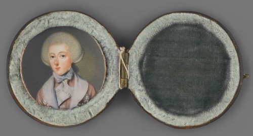 Portrait of a young man in a gray wig; artist unknown. Three-quarter male portrait, ca. 1770,
