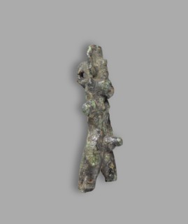 Mahes figurine, Mahes mythology. Uraeuses. Figurine of a walking ithyphallic male figure with a