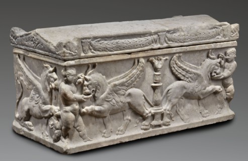 Children's sarcophagus with a depiction of griffins, The lid is shaped like a roof with tympanums;