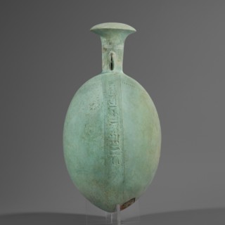New Year's canteen, Goluchów Greater Poland Voivodeship. Flat round faience canteen with a narrow