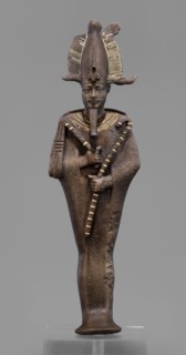Figurine of the god Osiris; mummy-shaped male figurine; Egyptian art; Egyptian deities; crowns;