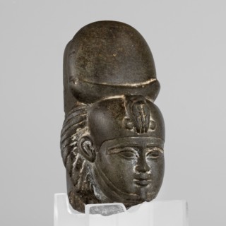 Fragment of a figurine of the god Khonsu — head. Fragment of a figurine: head of the god Khonsu
