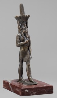Figurine of the god Nefertum; creator, Egyptian deity Nefertum; Egyptian religion and art; crown