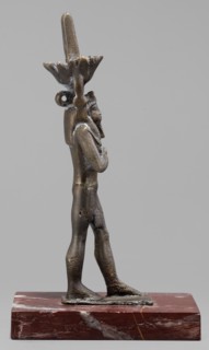 Figurine of the god Nefertum; creator, Egyptian deity Nefertum; Egyptian religion and art; crown;