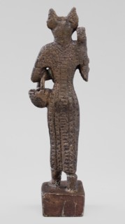 Figurine of the goddess Bastet. Figurine of a goddess with a cat's head, dressed in a